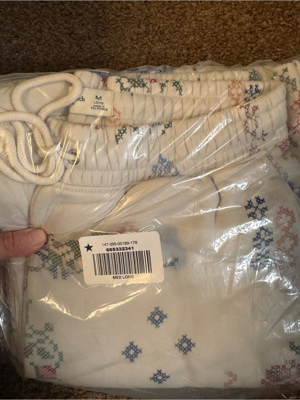 Women’s soft sweat pants with cross stitch design
